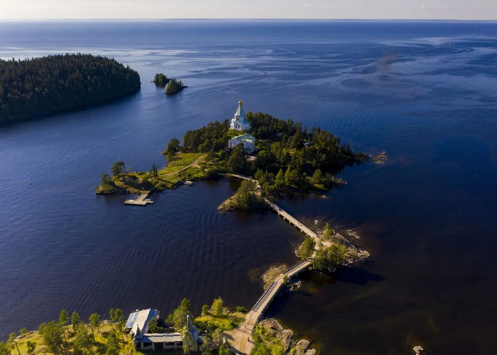 Aerial view of small green islands and bridges in the Ladoga skerries
